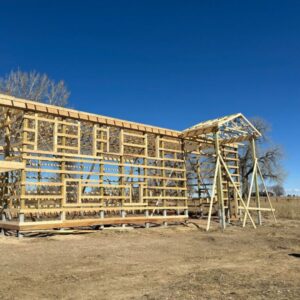 the wooden structure of a barn